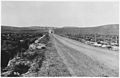 "8.4 miles from Lander, showing section of road over low level." - NARA - 292837.jpg